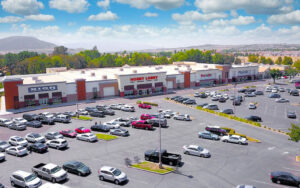 Aerial view of Suns Lake Village Shopping Center, located in Banning, CA. The bustling shopping center features a variety of stores and a lively atmosphere, offering a delightful shopping experience for visitors.