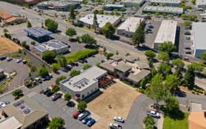 Aerial image of Chico, CA introducing Carrie Welch and Kelsey Watt as our newest Directors of Sales & Leasing, a dynamic team that will continue to focus on the greater Chico and Northern California markets.