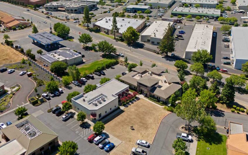 Aerial image of Chico, CA introducing Carrie Welch and Kelsey Watt as our newest Directors of Sales & Leasing, a dynamic team that will continue to focus on the greater Chico and Northern California markets.