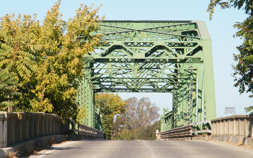 San Joaquin River bridge in Lathrop, CA reflecting ideal location for Lathrop retail opportunities.